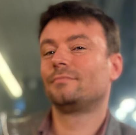 Michael walking through the city